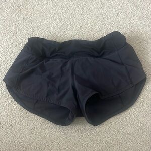 Women’s black Lululemon speed up shorts size 2 (fit more like 0)
